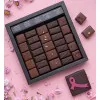 Boîte de chocolats Ilbarritz noir et lait et sa bouchée Octobre Rose
