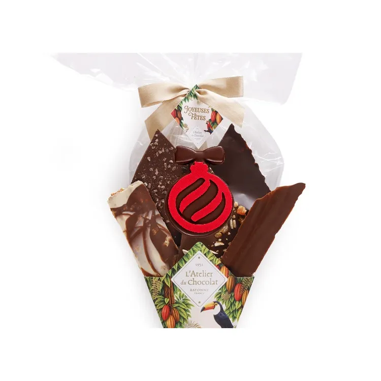 Focus Bouquet de Chocolat® joyeuses fêtes et sa bouchée boule rouge de Noël assortiment de fines feuilles de chocolat 255g