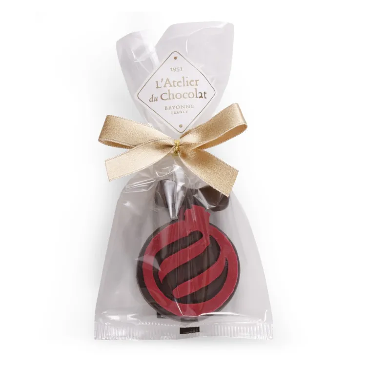 Bouchée boule rouge de Noël gianduja chocolat noir découpe emballage